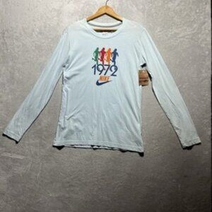 NWT Nike Women's Size L Large Light Blue Long Sleeved 1972 Runners T-Shirt